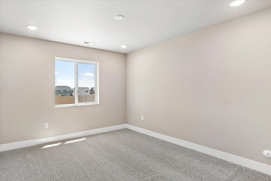 Spacious, unfurnished interior of a new home in The Trails at Aspen Ridge, Colorado Springs (Image 26).