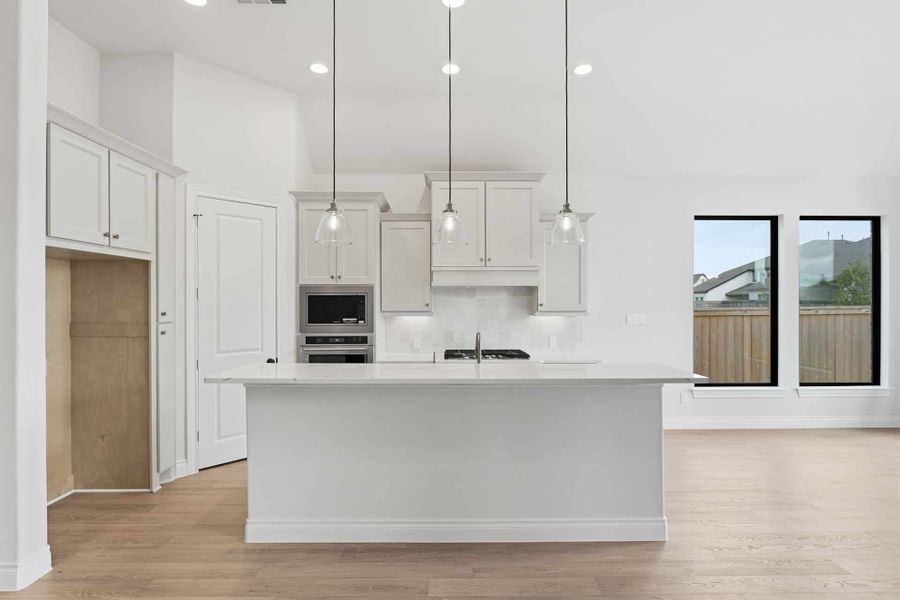 Furnished interior view inside a new home in Bridgeland 50′, Cypress (Image 7).