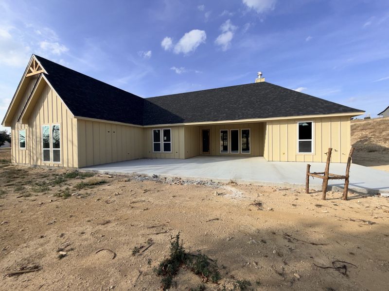 Front exterior of a new home in Saddle Crest Estates, Weatherford, TX, highlighting curb appeal (Image 4).