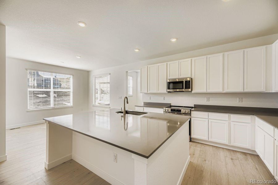 Furnished interior view inside a new home in Ken-Caryl Ranch: The Monarch Collection, Littleton (Image 6).