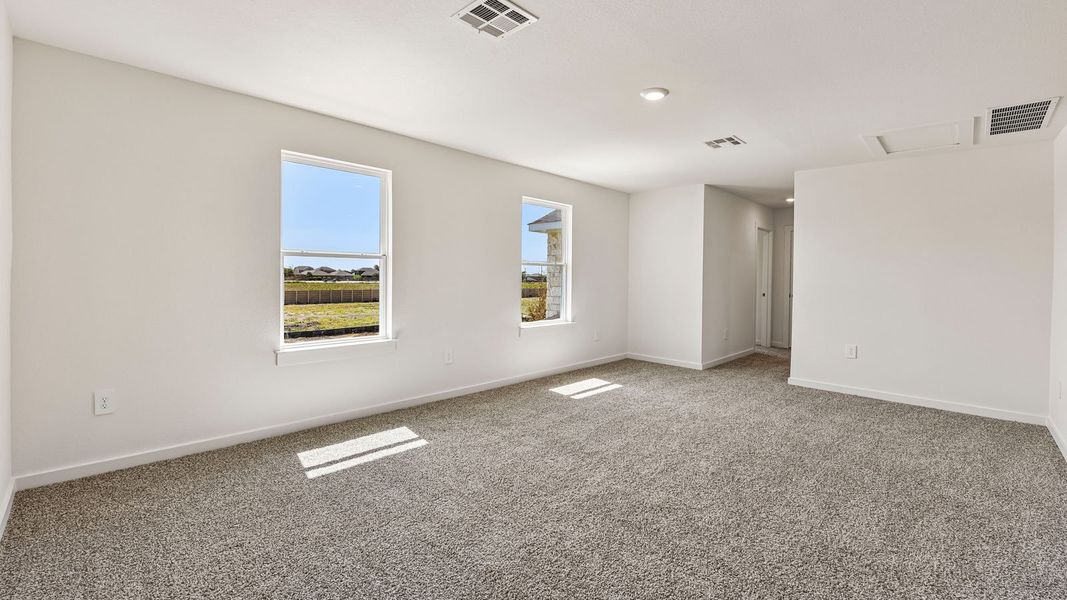Spacious, unfurnished interior of a new home in Monarch Ranch, Manor (Image 41).