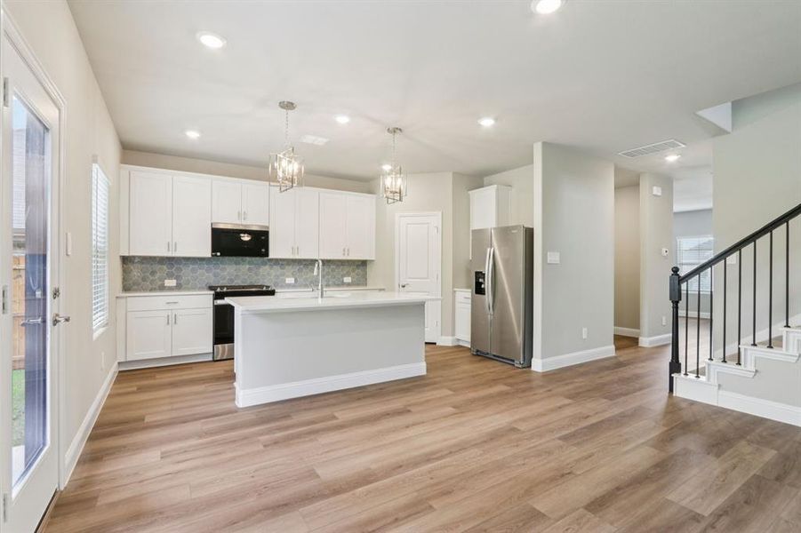 Furnished interior view inside a new home in Westmoor, Sherman (Image 12).