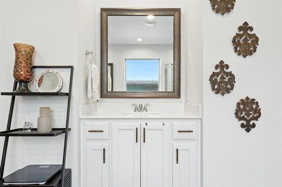 Bathroom featuring vanity