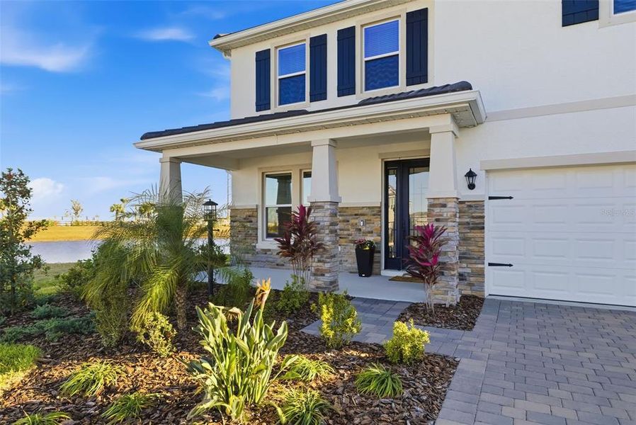 Exterior details and patio area of a home in Star Farms at Lakewood Ranch, Lakewood Ranch (Image 3).
