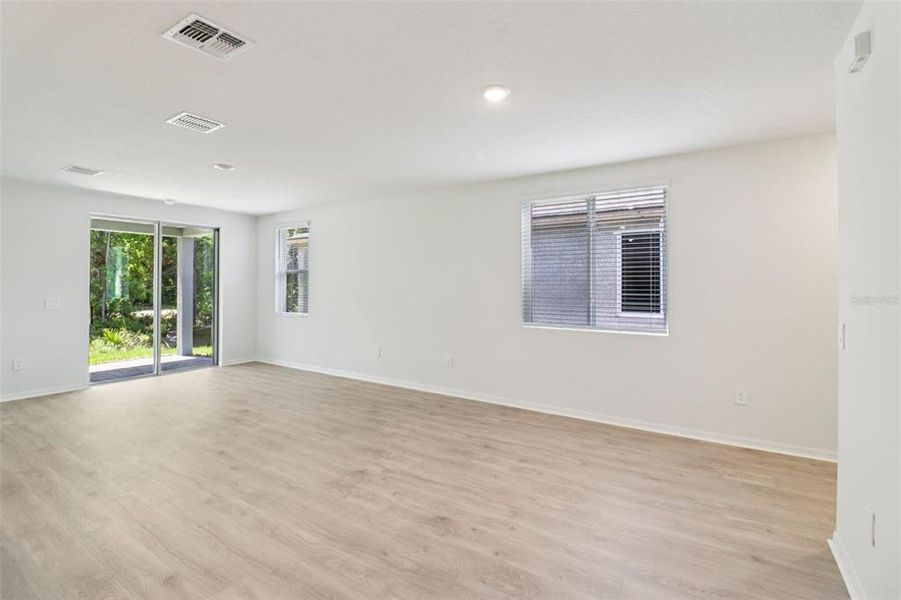 Spacious, unfurnished interior of a new home in Ridgehaven - Villas, Ormond Beach (Image 25).