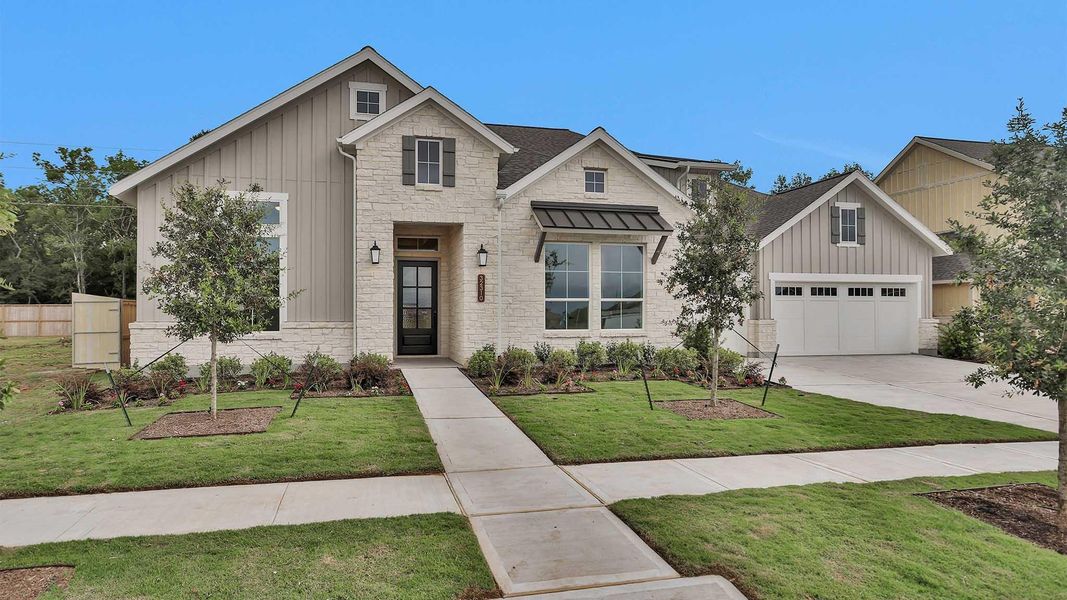 Front exterior of a new home in Fulshear Lakes 80', Fulshear, TX, highlighting curb appeal (Image 15).