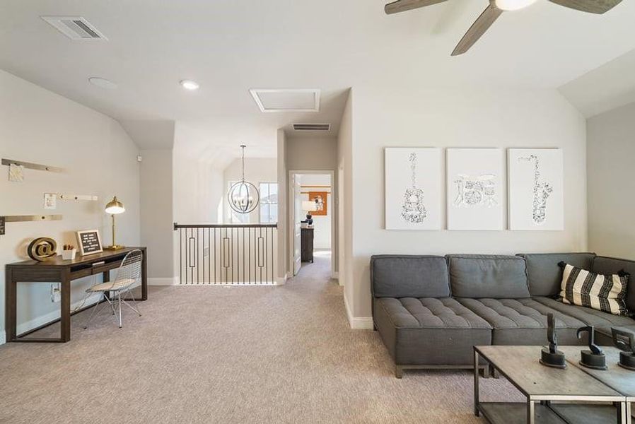 Furnished interior view inside a new home in Bridgeland, Cypress (Image 13).