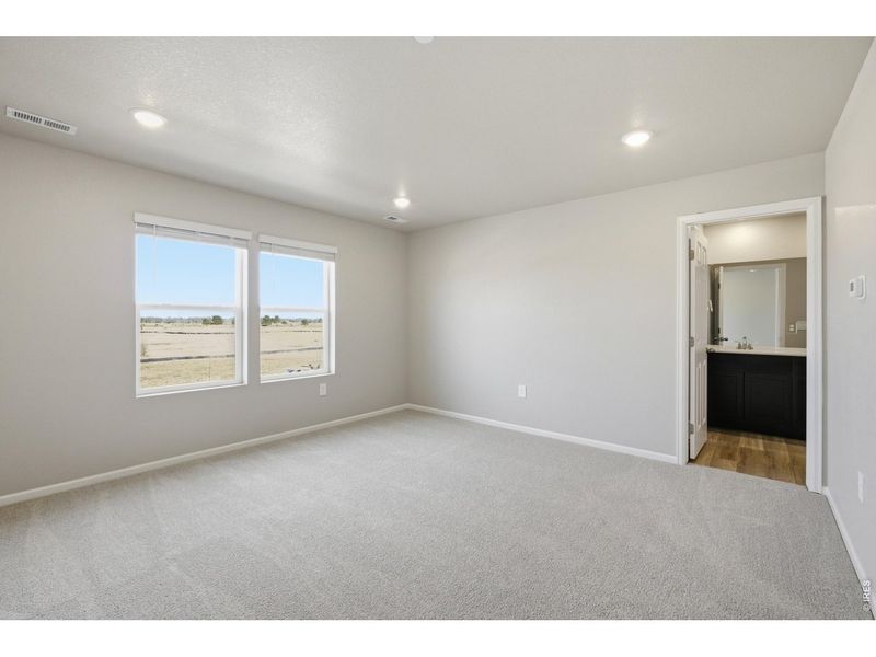 Spacious, unfurnished interior of a new home in Poudre Heights: The Meadow Collection, Windsor (Image 16).