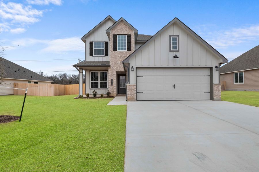Front exterior of a new home in Liberty Oaks, Waco, TX, highlighting curb appeal (Image 1). Front exterior of a new home in Liberty Oaks, Waco, TX, highlighting curb appeal (Image 1).
