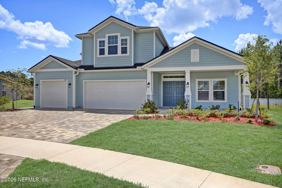 Front exterior of a new home in , Jacksonville, FL, highlighting curb appeal (Image 1). Front exterior of a new home in , Jacksonville, FL, highlighting curb appeal (Image 1).