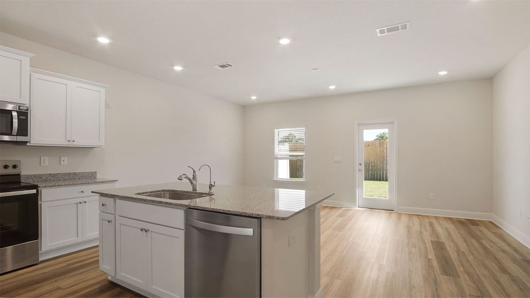 Representative furnished interior of a home built from the Palm Interior by D.R. Horton in Caballeros Estates Townhomes at Hombre, Panama City Beach (Image 9). Representative furnished interior of a home built from the Palm Interior by D.R. Horton in Caballeros Estates Townhomes at Hombre, Panama City Beach (Image 9).