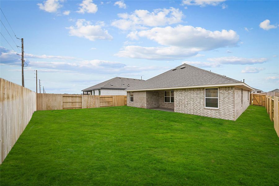 Exterior details and patio area of a home in River Ranch Trails, Dayton (Image 2). Exterior details and patio area of a home in River Ranch Trails, Dayton (Image 2).