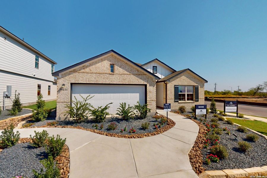 Front exterior of a new home in Paloma Park, Converse, TX, highlighting curb appeal (Image 1). Front exterior of a new home in Paloma Park, Converse, TX, highlighting curb appeal (Image 1).