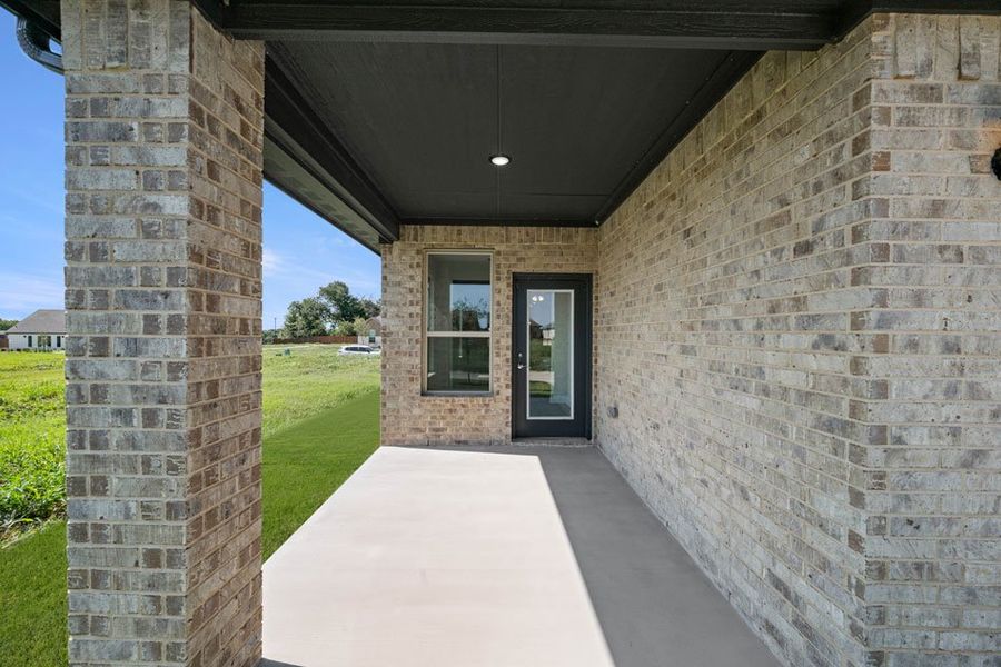 Front exterior of a new home in Redden Farms – Active Adult, Midlothian, TX, highlighting curb appeal (Image 28). Front exterior of a new home in Redden Farms – Active Adult, Midlothian, TX, highlighting curb appeal (Image 28).