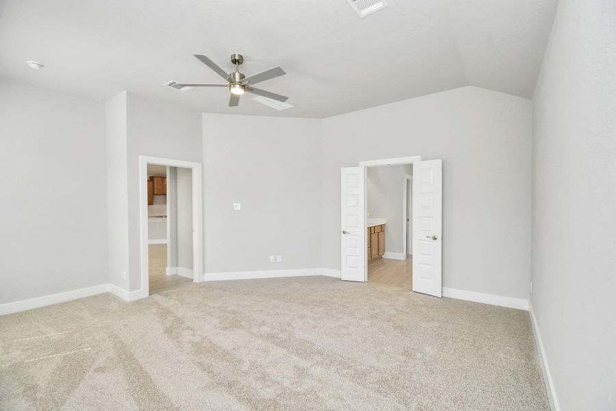 Come and unwind after a long day in this magnificent primary suite! This spacious room features plush carpet, warm paint, high ceilings and large windows with privacy blinds. Come and unwind after a long day in this magnificent primary suite! This spacious room features plush carpet, warm paint, high ceilings and large windows with privacy blinds.