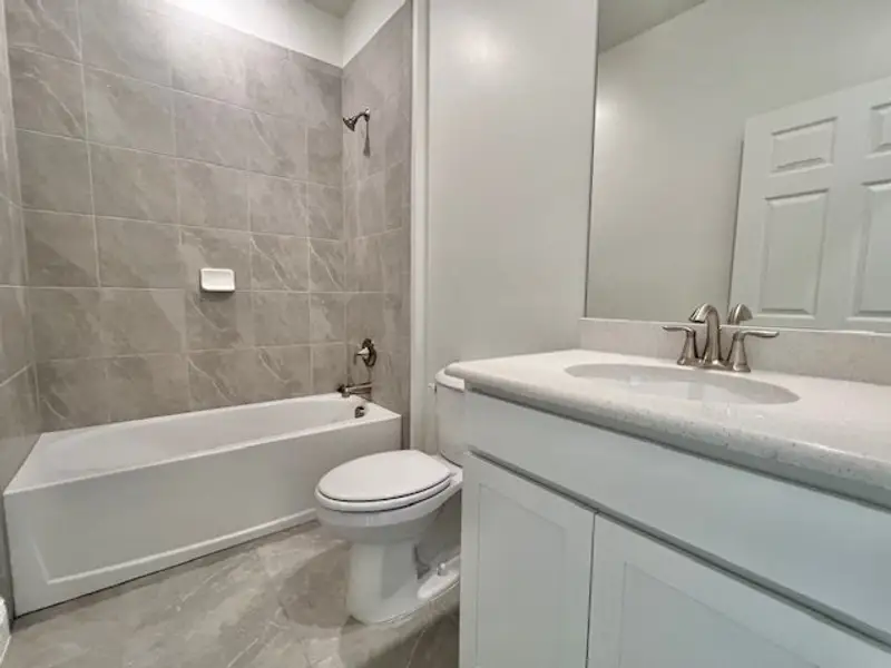 Furnished interior view inside a new home in Lakes At St Sebastian, Micco (Image 7).