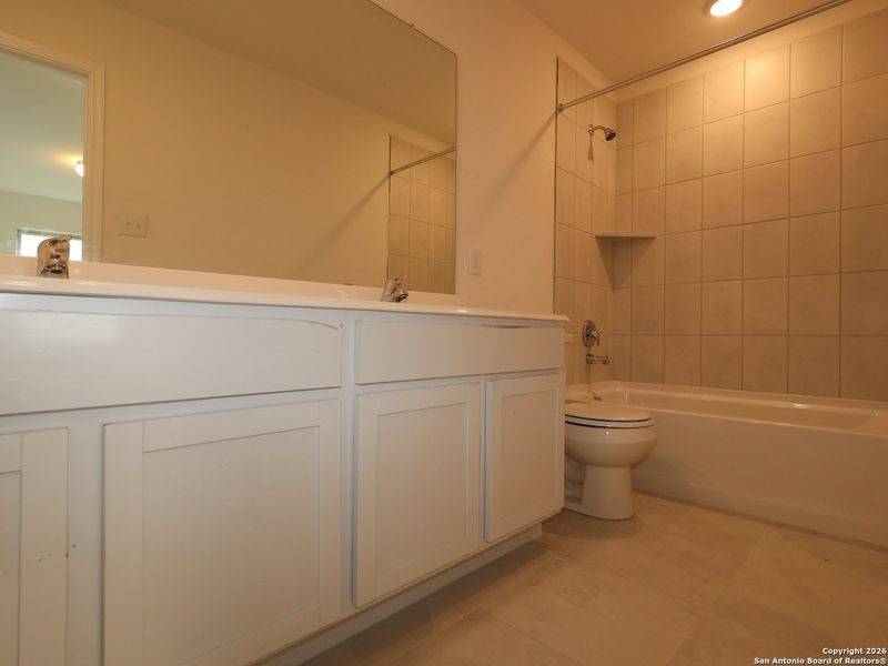 Furnished interior view inside a new home in Greenspoint Heights, Seguin (Image 12).