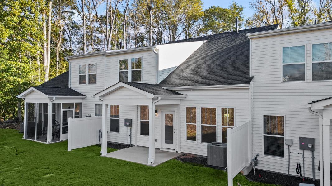 Exterior details and patio area of a home in Camden Cottages, Greenville (Image 21).