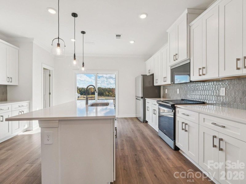 Photo is not of the actual home, but is an inspirational photo of builder’s model home and may depict options, furnishings, and/or decorator features that are not included