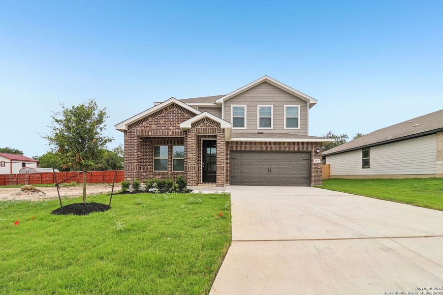 Front exterior of a new home in Royal Crest, San Antonio, TX, highlighting curb appeal (Image 30). Front exterior of a new home in Royal Crest, San Antonio, TX, highlighting curb appeal (Image 30).