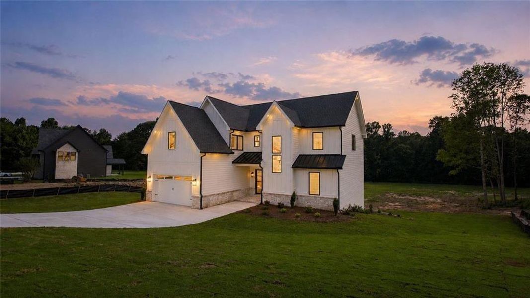Front exterior of a new home in , Flowery Branch, GA, highlighting curb appeal (Image 28).