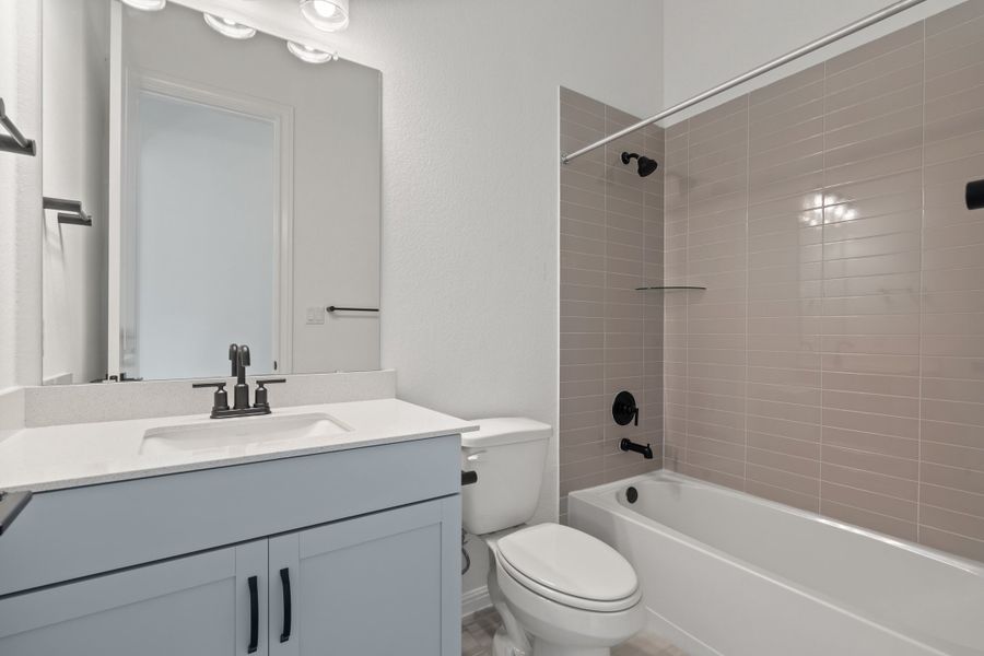 Representative furnished interior of a home built from the Waterville by Ashton Woods in The Trails at Carmel, Pflugerville (Image 17).