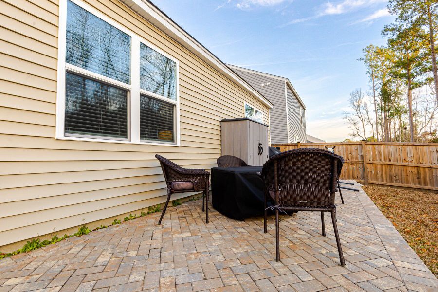 Exterior details and patio area of a home in Reserve at Mallard Crossing, Summerville (Image 30).