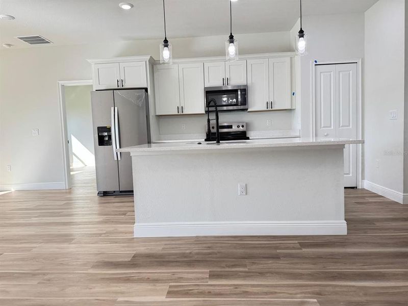 Furnished interior view inside a new home in , Ocala (Image 3).