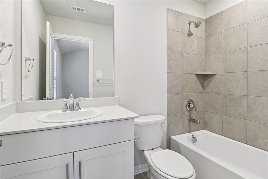 Photo is not of the actual home, but is an inspirational photo of builder’s model home and may depict options, furnishings, and/or decorator features that are not included.