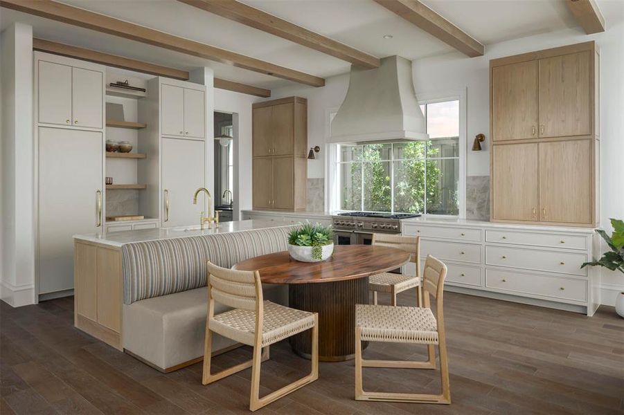 Dining area featuring beam ceiling and dark wood-type flooring Dining area featuring beam ceiling and dark wood-type flooring