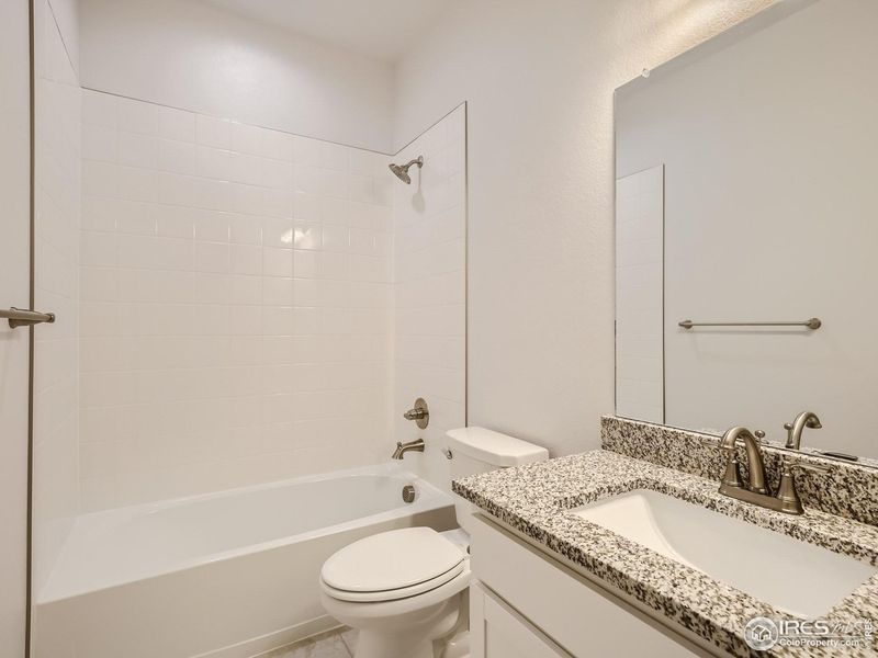 Furnished interior view inside a new home in RainDance, Windsor (Image 6).