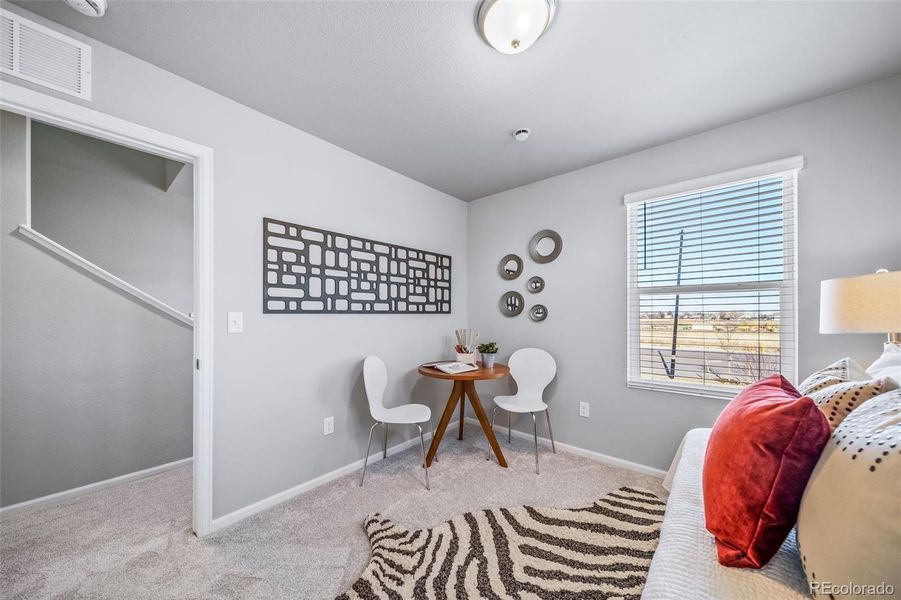 Furnished interior view inside a new home in Muegge Farms, Bennett (Image 40).