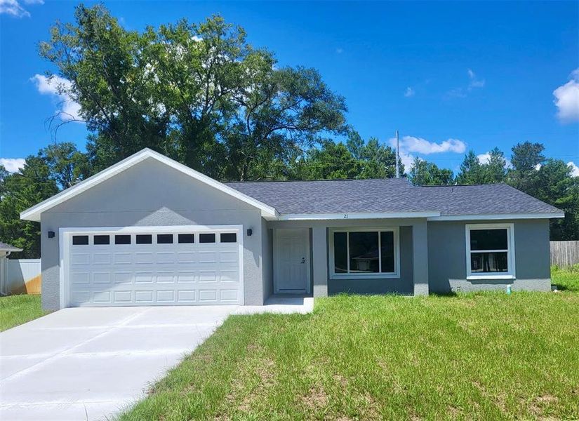 Front exterior of a new home in , Ocklawaha, FL, highlighting curb appeal (Image 1). Front exterior of a new home in , Ocklawaha, FL, highlighting curb appeal (Image 1).