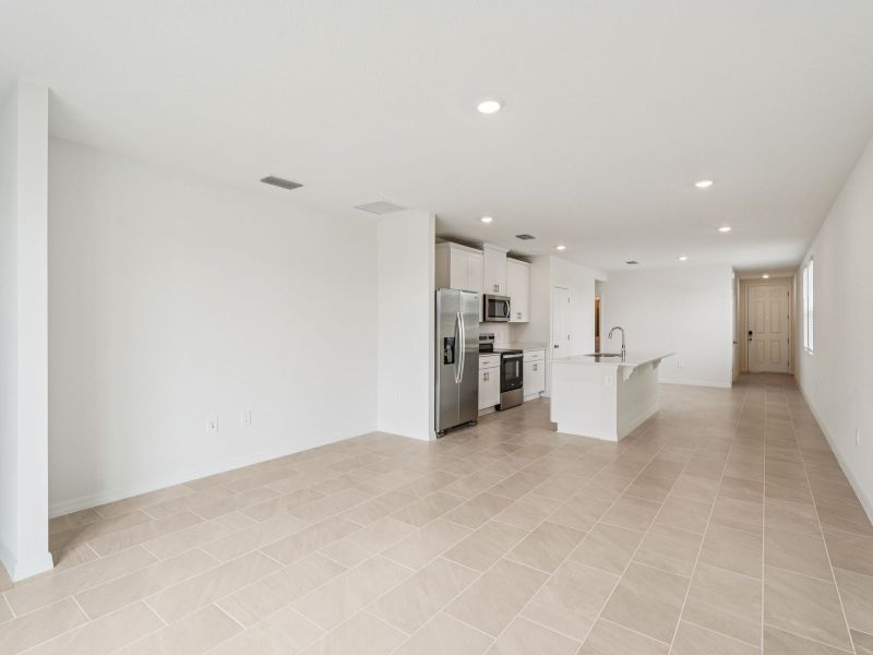 Spacious, unfurnished interior of a new home in Villamar - Classic Series, Winter Haven (Image 6).