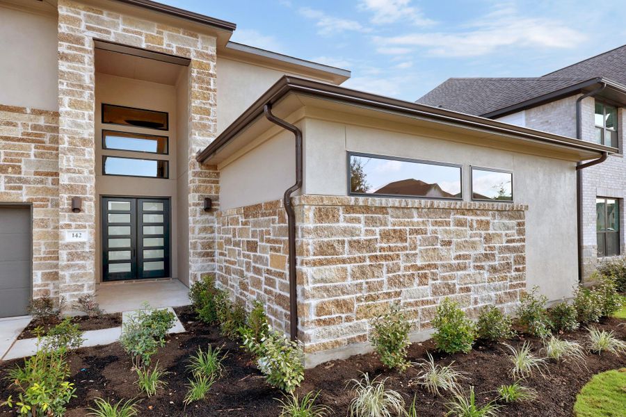 Exterior details and patio area of a home in Santa Rita Ranch, Liberty Hill (Image 3).