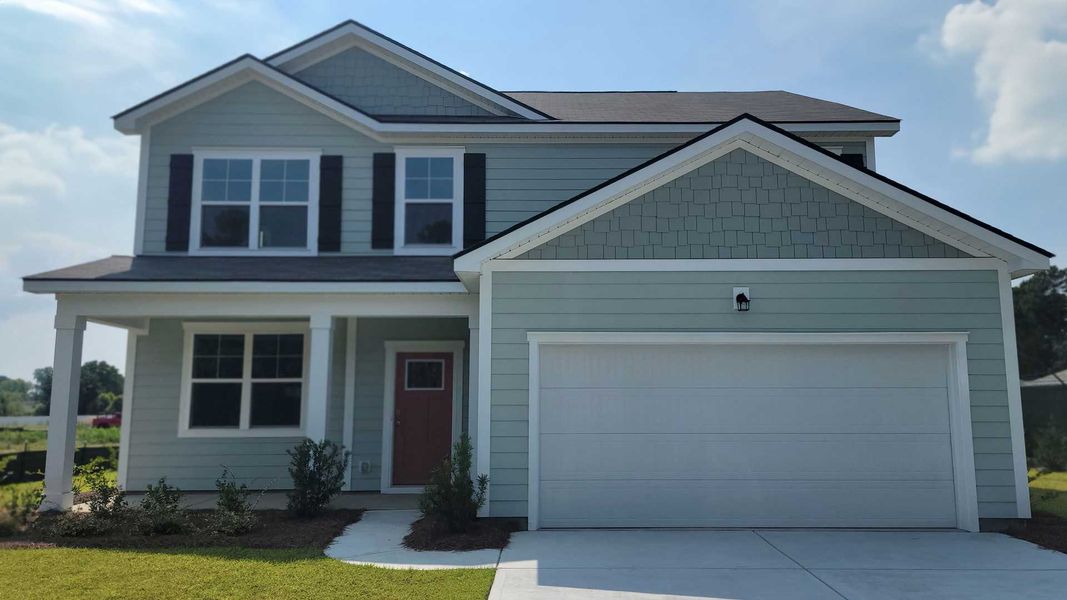 Representative exterior photo of a completed home built from the ELLE by D.R. Horton in Ravenloft, Conway, SC (Image 12).