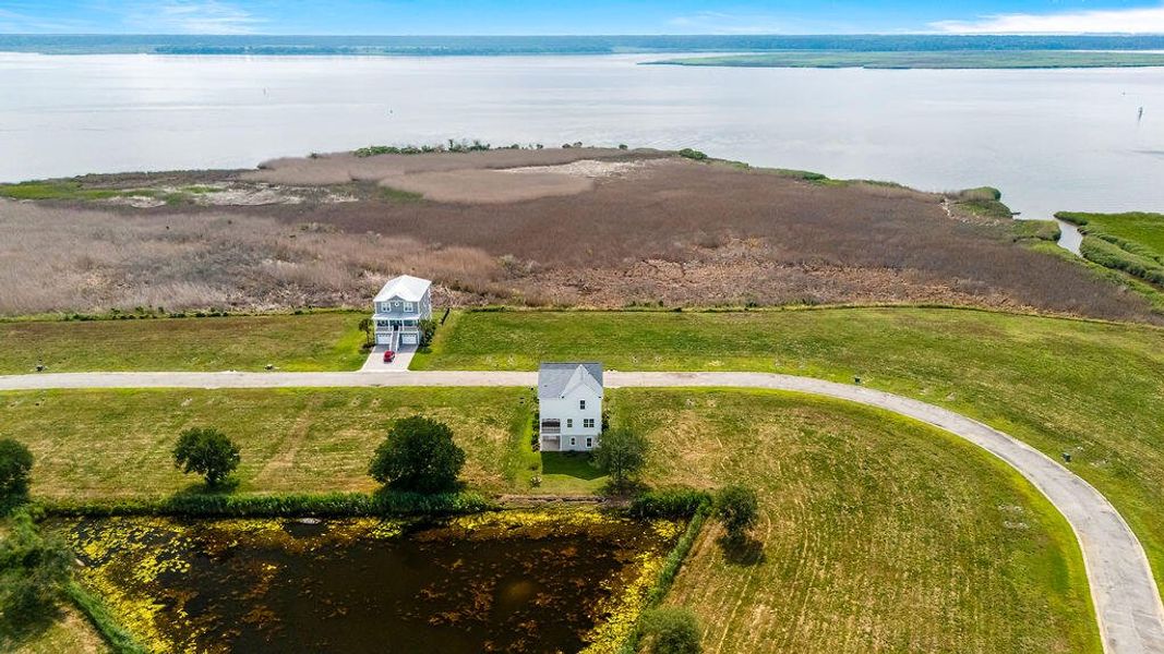 Front exterior of a new home in , Georgetown, SC, highlighting curb appeal (Image 23).