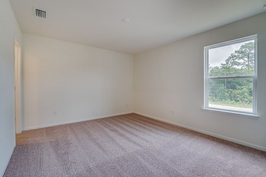 Spacious, unfurnished interior of a new home in Orchard Park Townhomes, St. Augustine (Image 7).