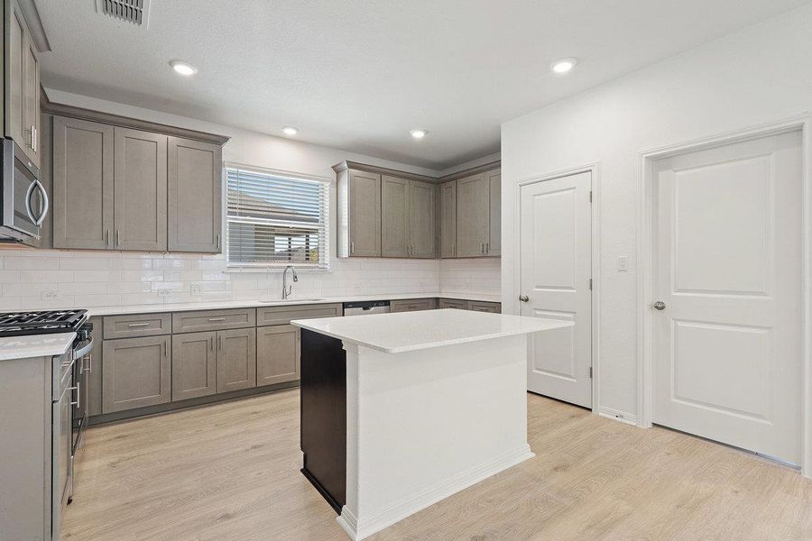Furnished interior view inside a new home in Sage Hollow, Kyle (Image 5).