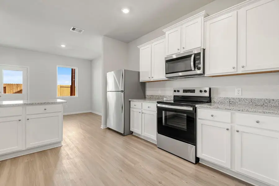 Furnished interior view inside a new home in Cypress Trails at Bauer Landing, Hockley (Image 3).