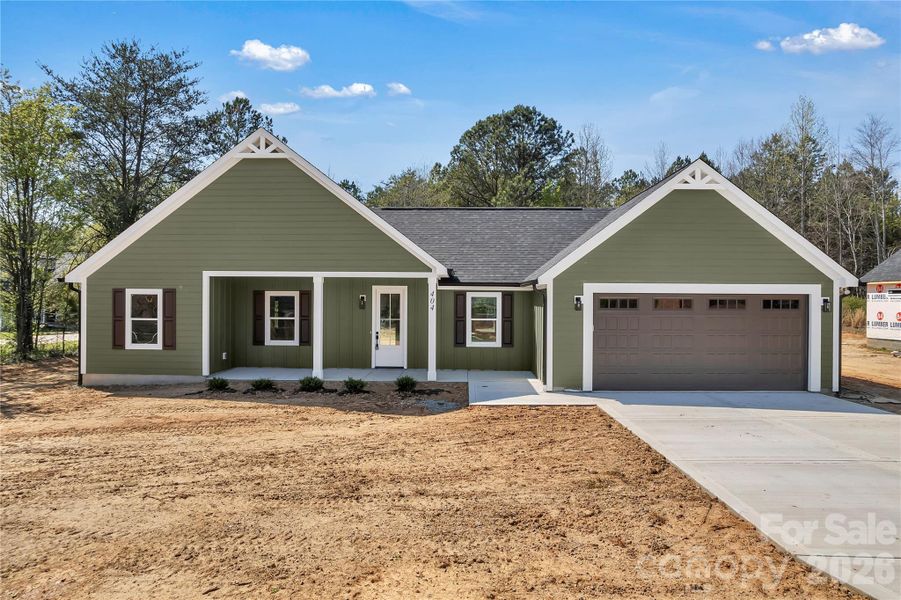 Front exterior of a new home in , Cherryville, NC, highlighting curb appeal (Image 27).
