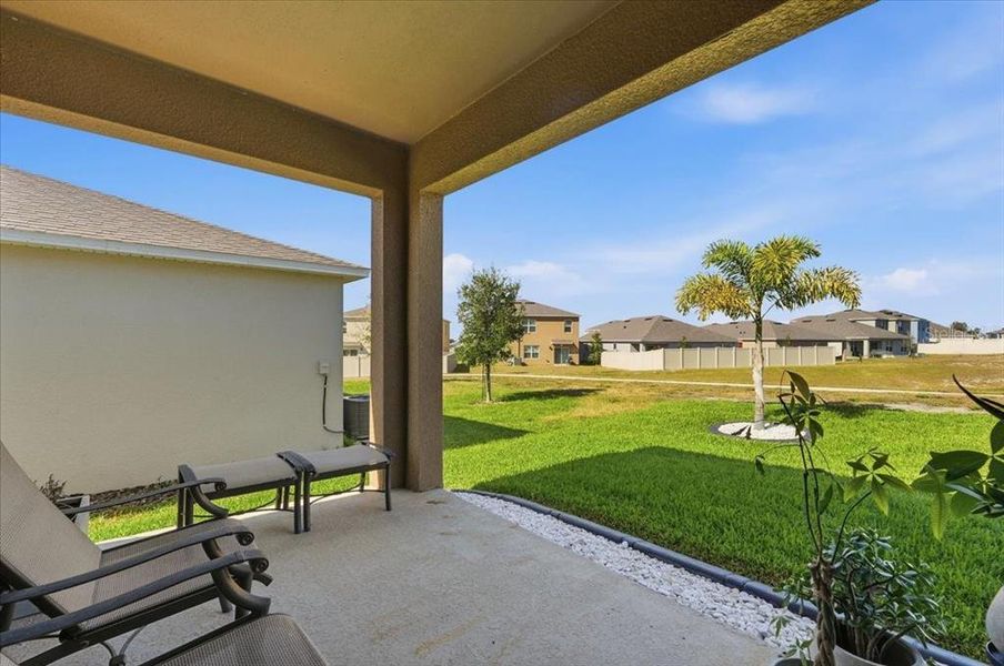 Exterior details and patio area of a home in Eden Hills, Lake Alfred (Image 31). Exterior details and patio area of a home in Eden Hills, Lake Alfred (Image 31).
