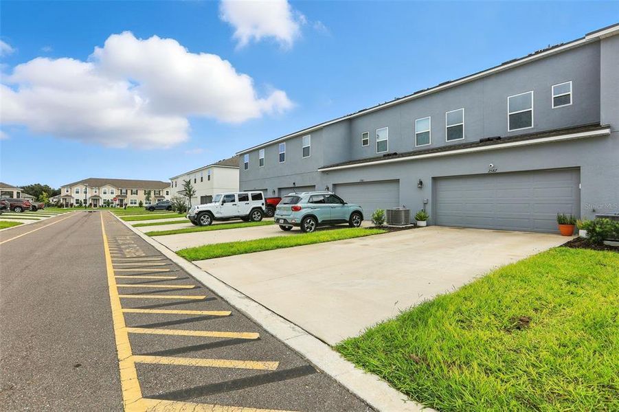 Front exterior of a new home in Waterbrooke, Clermont, FL, highlighting curb appeal (Image 25). Front exterior of a new home in Waterbrooke, Clermont, FL, highlighting curb appeal (Image 25).