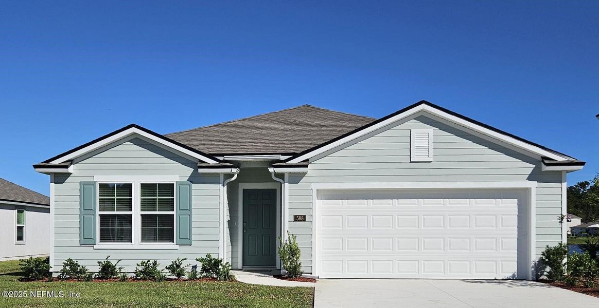 Front exterior of a new home in Entrada, St. Augustine, FL, highlighting curb appeal (Image 21).