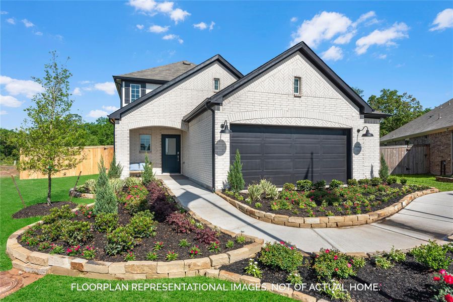 Front exterior of a new home in Moran Ranch, Willis, TX, highlighting curb appeal (Image 2). Front exterior of a new home in Moran Ranch, Willis, TX, highlighting curb appeal (Image 2).