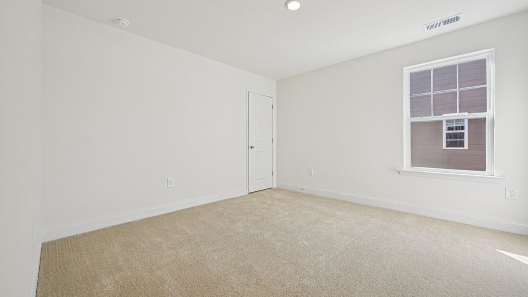 Representative furnished interior of a home built from the Wagener by DRB Homes in Weavers Pointe, Zebulon (Image 31).