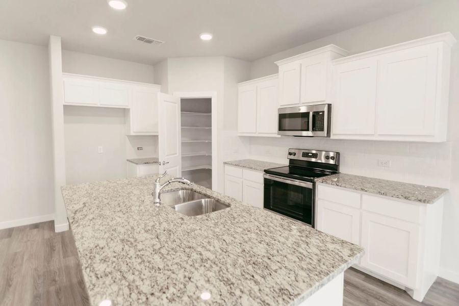 Representative furnished interior of a home built from the Norwood by Stonehollow Homes in Heritage Grove, Blue Ridge (Image 11). Representative furnished interior of a home built from the Norwood by Stonehollow Homes in Heritage Grove, Blue Ridge (Image 11).