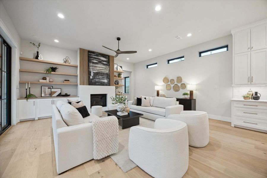 Great room with custom fireplace detail.