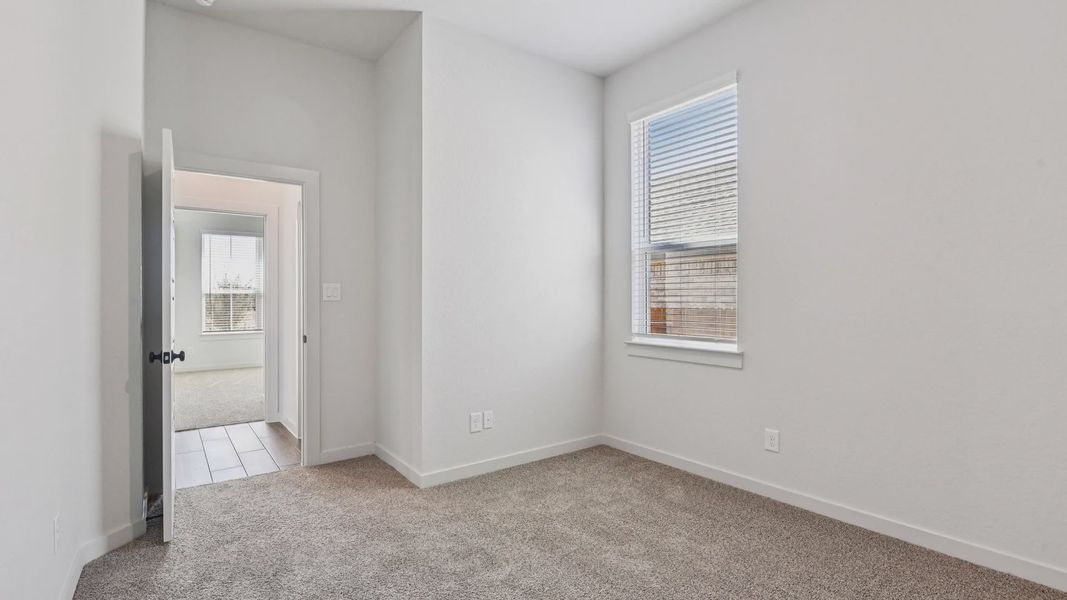 Representative unfurnished interior of a home built from the Marshall by Chesmar Homes in Stream Waters, Seguin (Image 21). Representative unfurnished interior of a home built from the Marshall by Chesmar Homes in Stream Waters, Seguin (Image 21).
