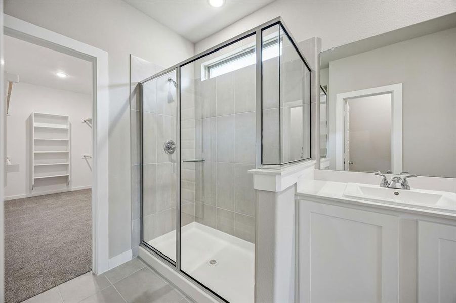 Primary Bathroom in the Willow home plan by Trophy Signature Homes – REPRESENTATIVE PHOTO